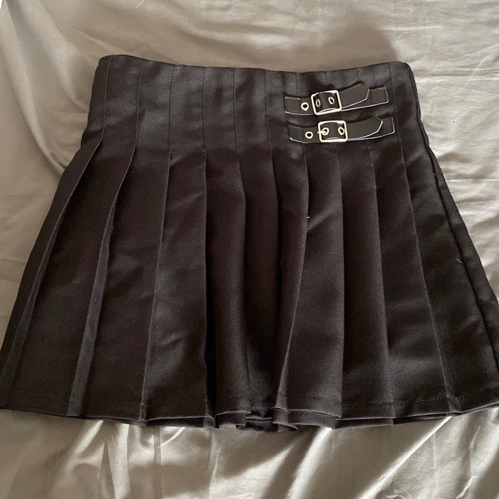 It is a black skirt It is a size medium in women’s.